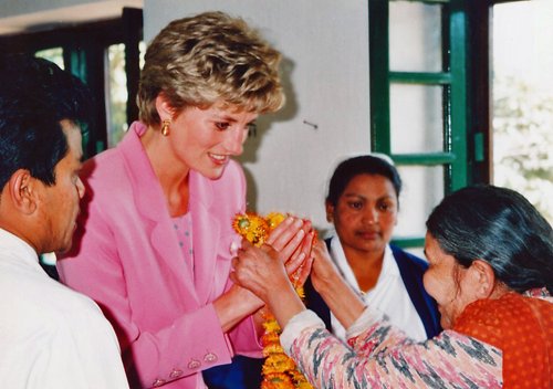 A leprosy patient greets Princess Diana at Anandaban Hospital, Nepal, in 1993