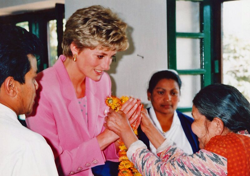 A leprosy patient at Anandaban Hospital greets Princess Diana in 1993 (002).jpg