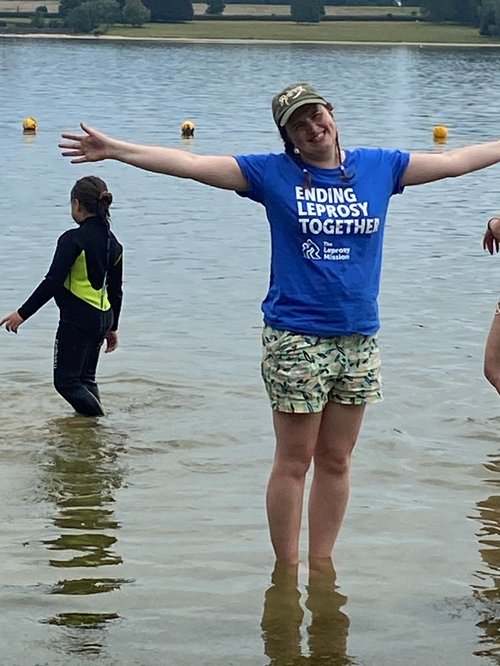 Freya soaks her sore feet in Rutland Water.jpg