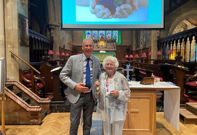 Margaret Williams with Trevor Grant, Community Partnerships Manager at The Leprosy Mission, at her 90th birthday celebrations and launch of her first novel The Leprosy Bell at Christ Church, Swindon.jpg