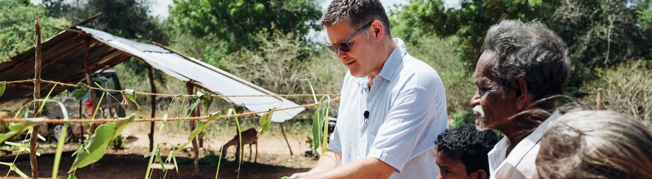 Peter Waddup opens a new well for a family affected by leprosy in Sri Lanka.jpg