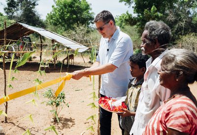 Peter Waddup opens a new well for a family affected by leprosy in Sri Lanka.jpg