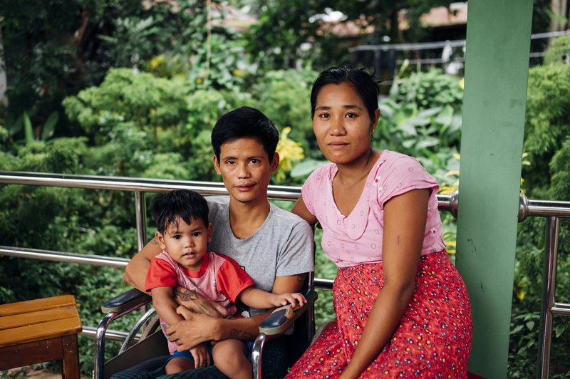 Phyo, a patient at Mawlamyine Hospital in Myanmar, and his family.