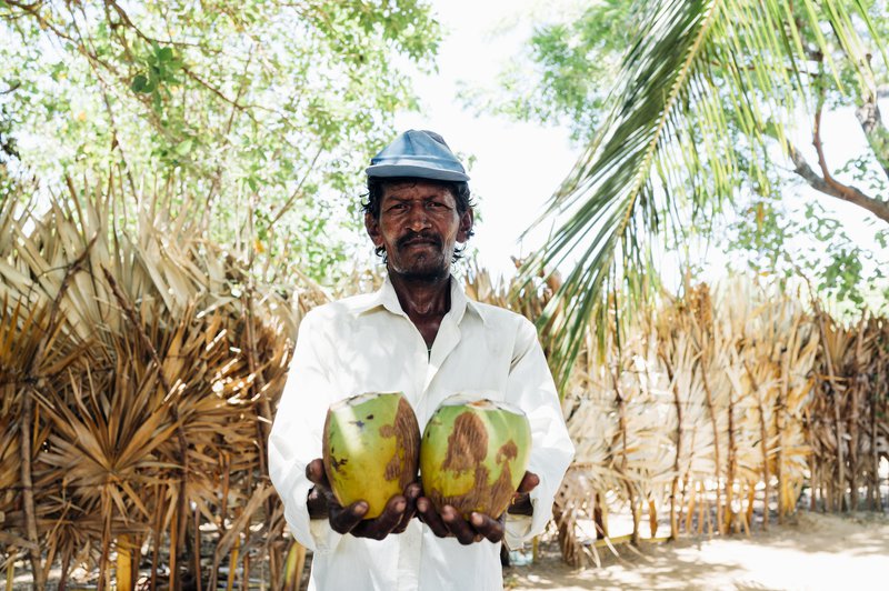 Kunam with his coconuts