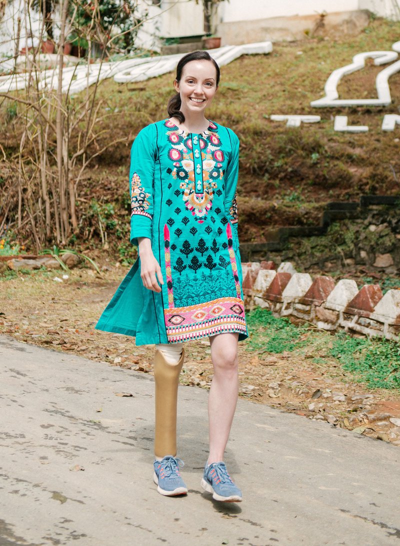 Stef Reid tests out the prosthetic leg made for her at Anandaban Hospital